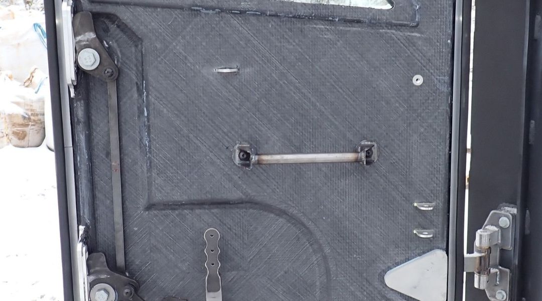 Composite armoured door